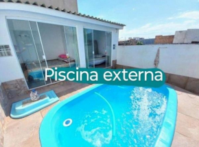Casa com Piscina no verão e inverno sem ,vaga para carros médios leves